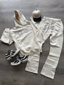 StyleGods Signature Script Stacked Pullover Jogging Suit - Cream/Black Nailhead